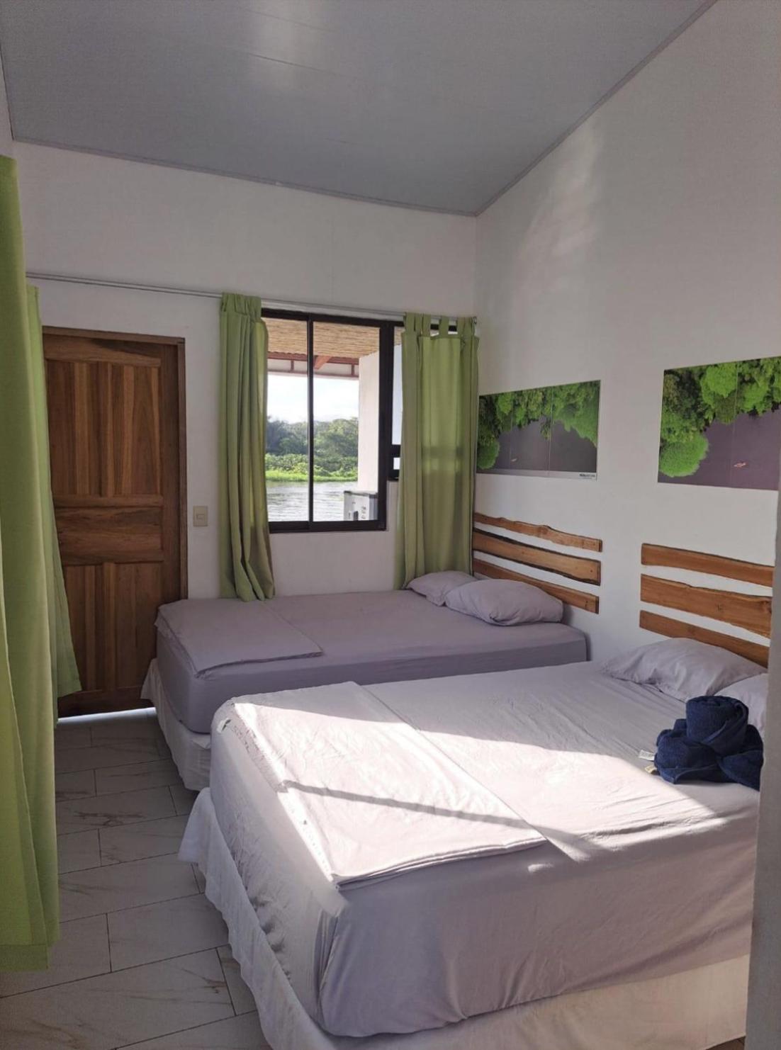 Hotel Pura Natura Riverside Тортугеро Экстерьер фото